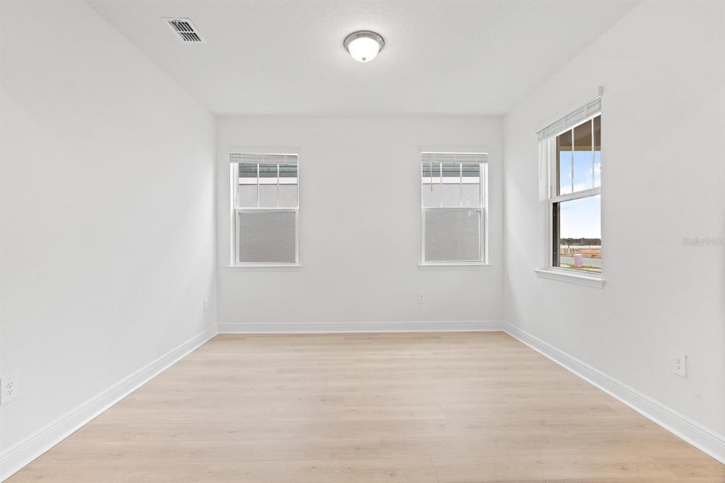 2276 Hen Road Minneola, FL 34715 - Photo 37 of 40 an empty room with a window