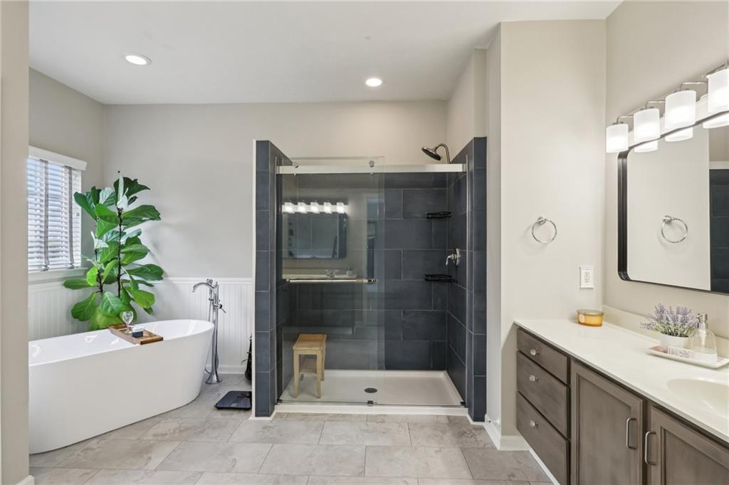 319 Buffalo Ridge Road Peters Township, PA 15317 - Photo 22 of 47 Primary Ensuite w/ Brand New Soaking Tub & Spa-Like Shower & TWO VANITIES. Claim yours!