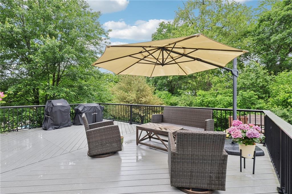 319 Buffalo Ridge Road Peters Township, PA 15317 - Photo 7 of 47 Seriously Spacious Trex Deck with a Lush Wooded View