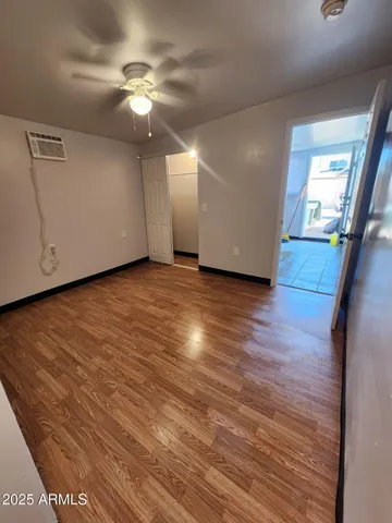 a view of a kitchen with a sink and a cabinets