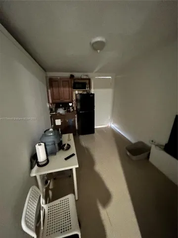 a bathroom with a sink toilet and mirror