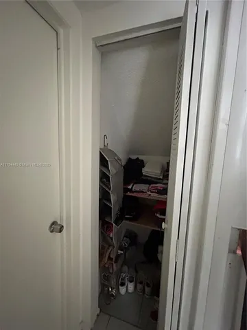 a bathroom with a tub and a shower