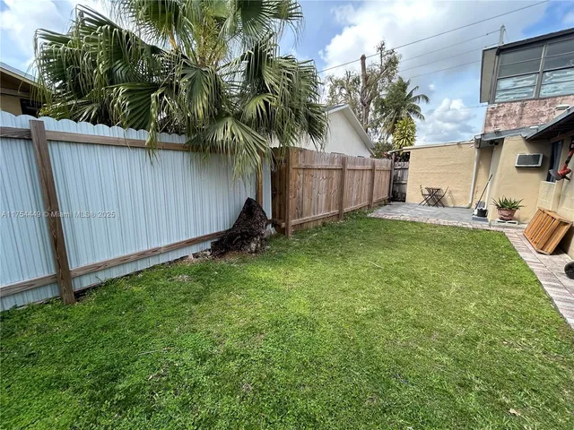 a view of outdoor space and yard