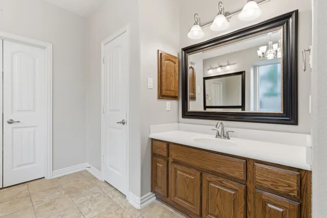 a kitchen with a cabinets and a stainless steel appliances