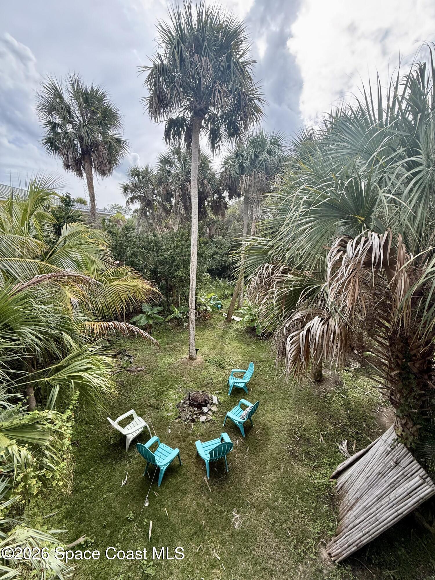 111 Seagrape Road Melbourne Beach, FL 32951 - Photo 13 of 19 a view of yard from a lake
