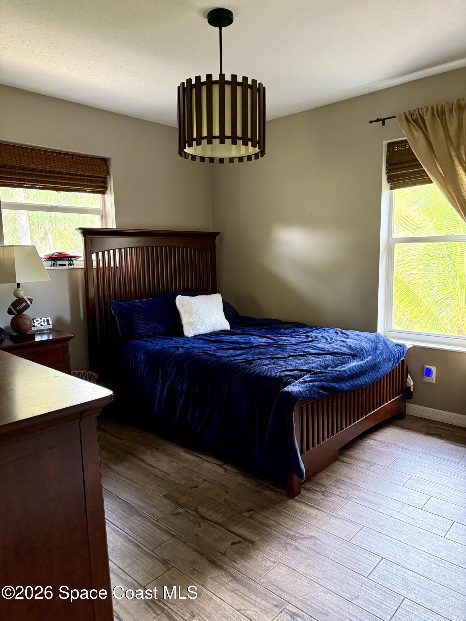 111 Seagrape Road Melbourne Beach, FL 32951 - Photo 15 of 19 a living room with a couch and a table