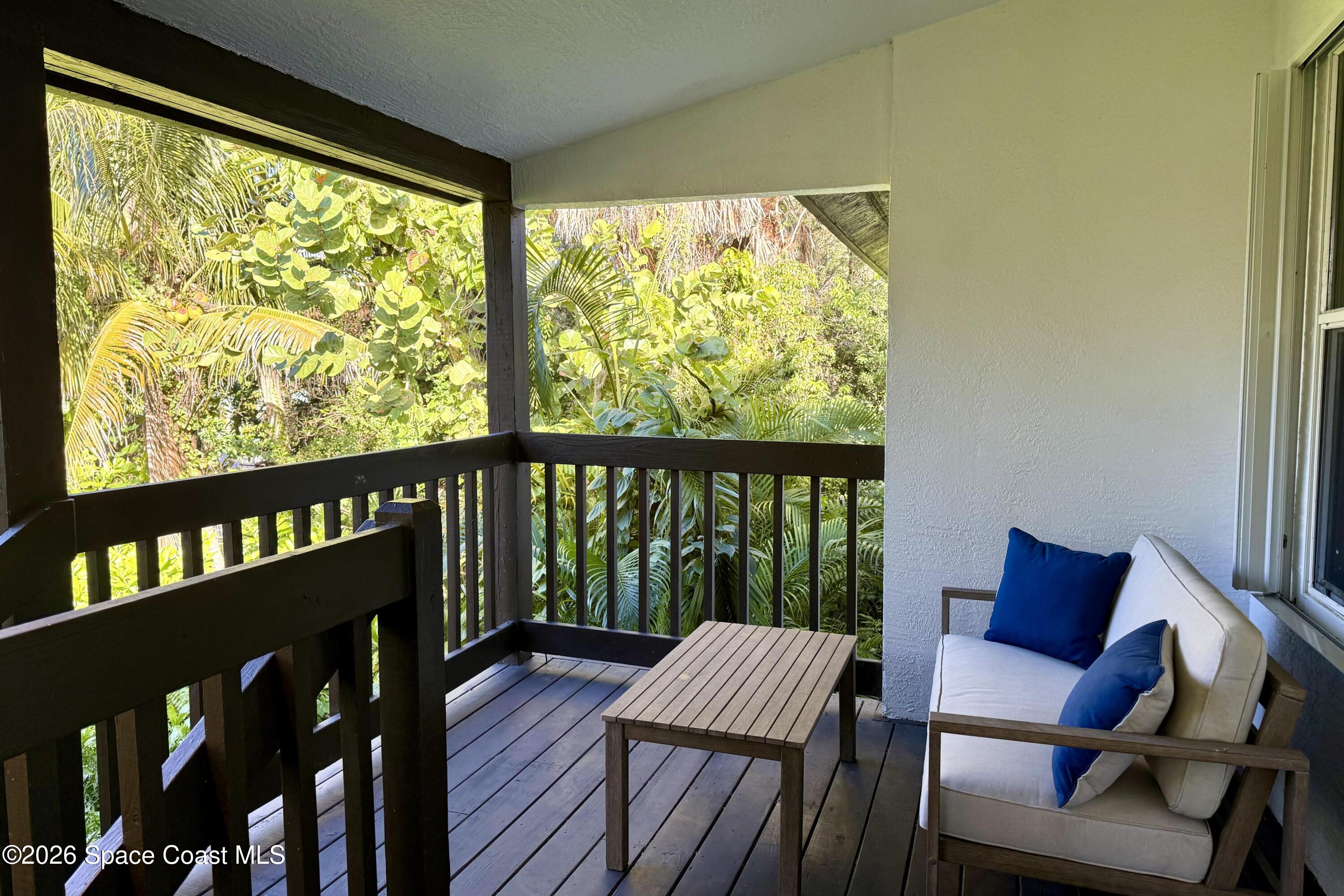 111 Seagrape Road Melbourne Beach, FL 32951 - Photo 3 of 19 a view of a city from a chairs