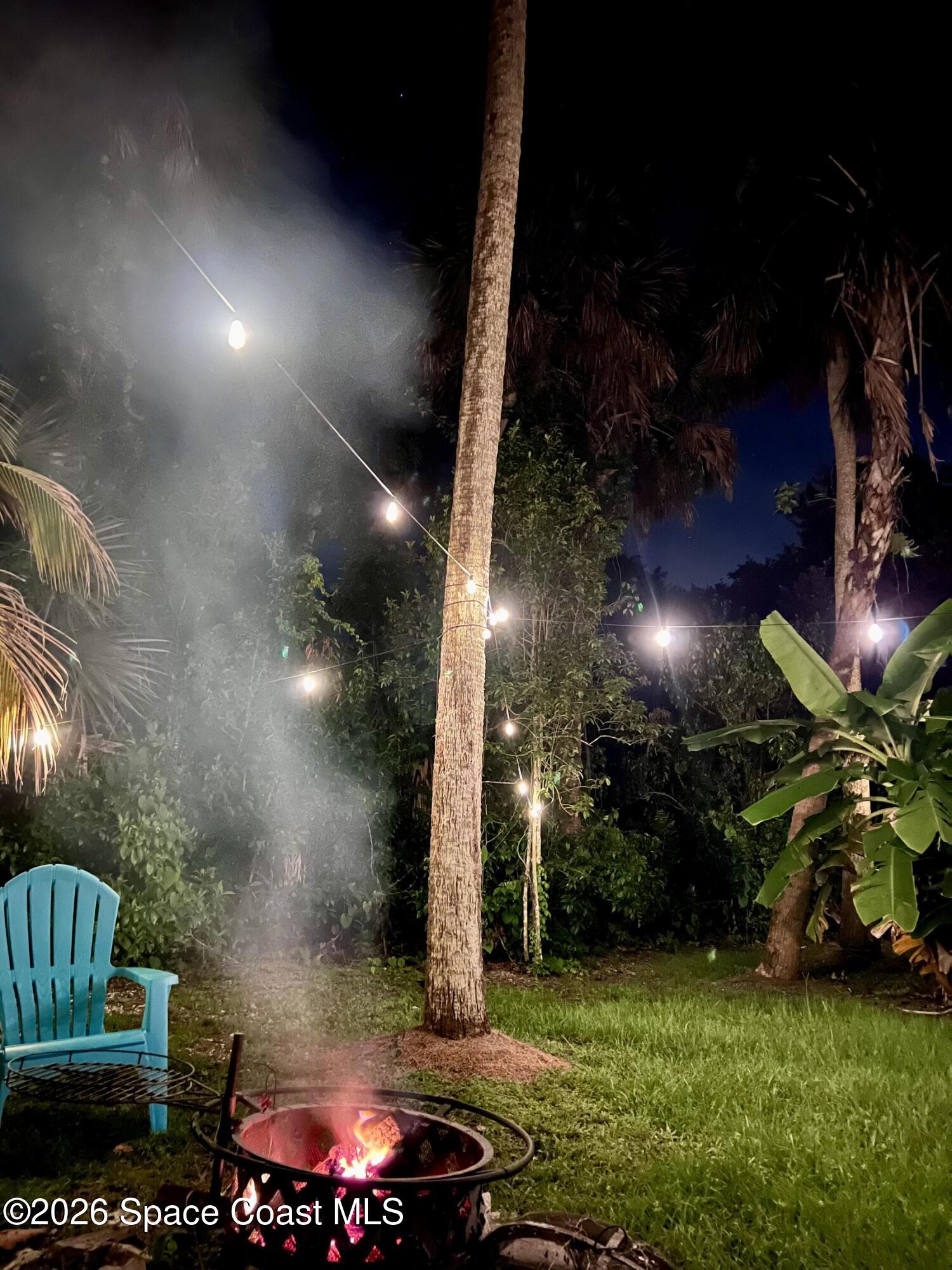 111 Seagrape Road Melbourne Beach, FL 32951 - Photo 8 of 19 a view of a yard