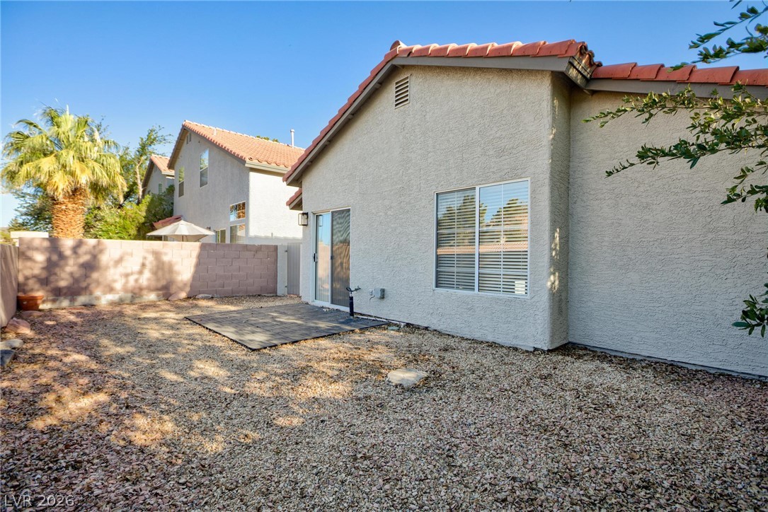 2254 Ramsgate Drive Henderson, NV 89074 - Photo 34 of 43 Private backyard with a patio provides space for outdoor enjoyment.