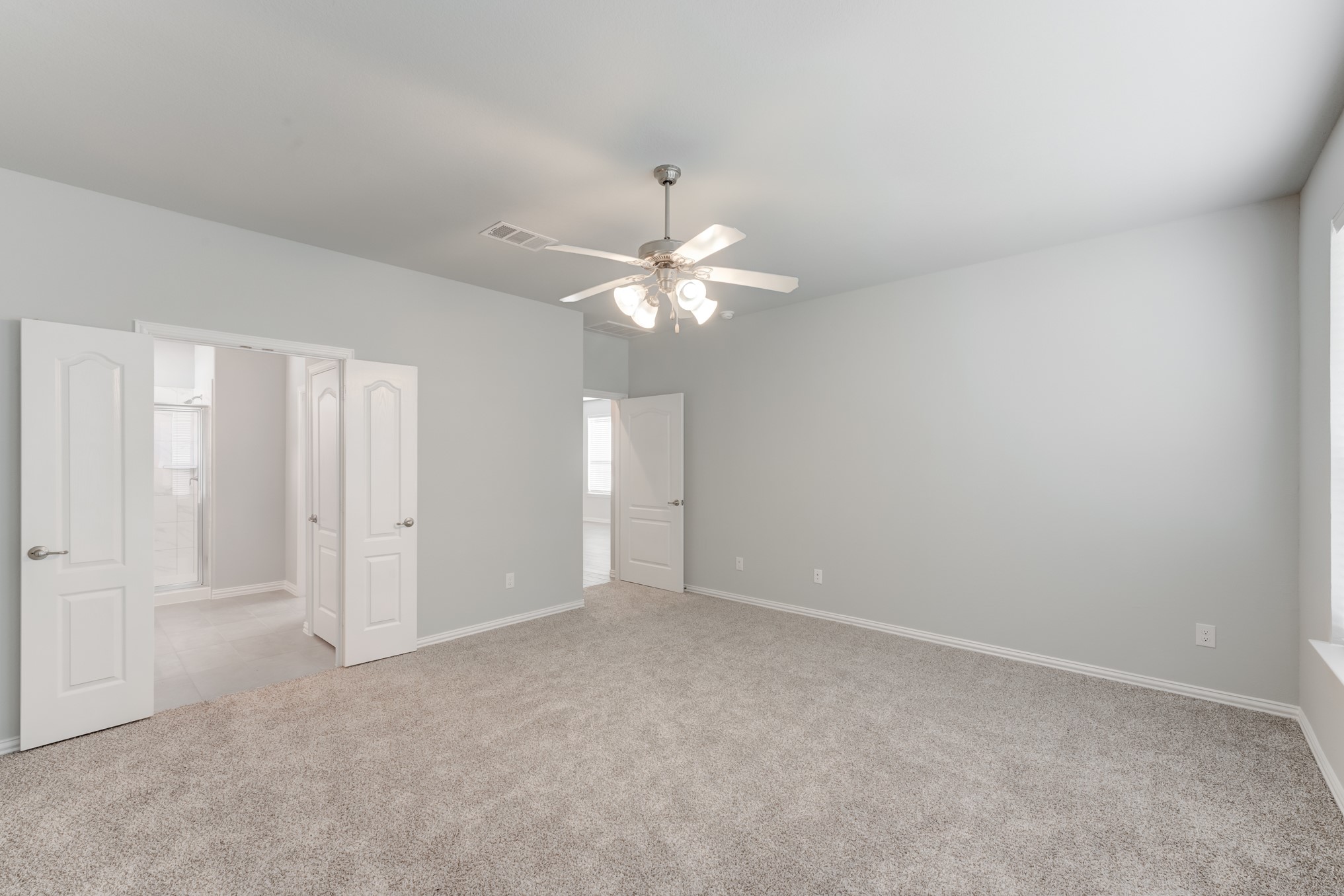 1225 Red Hills Drive Rosharon, TX 77583 - Photo 15 of 27 a view of an empty room with a chandelier fan