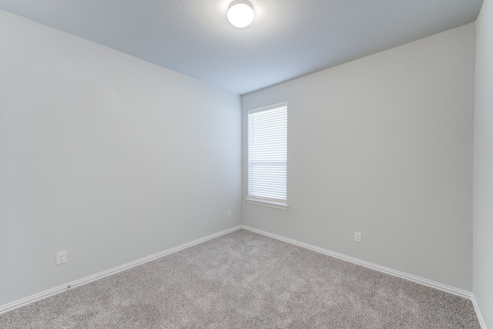 1225 Red Hills Drive Rosharon, TX 77583 - Photo 24 of 27 an empty room with a window