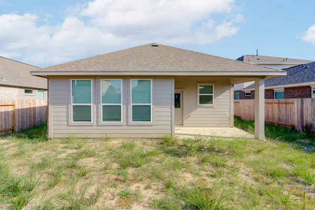 a house view with a garden space