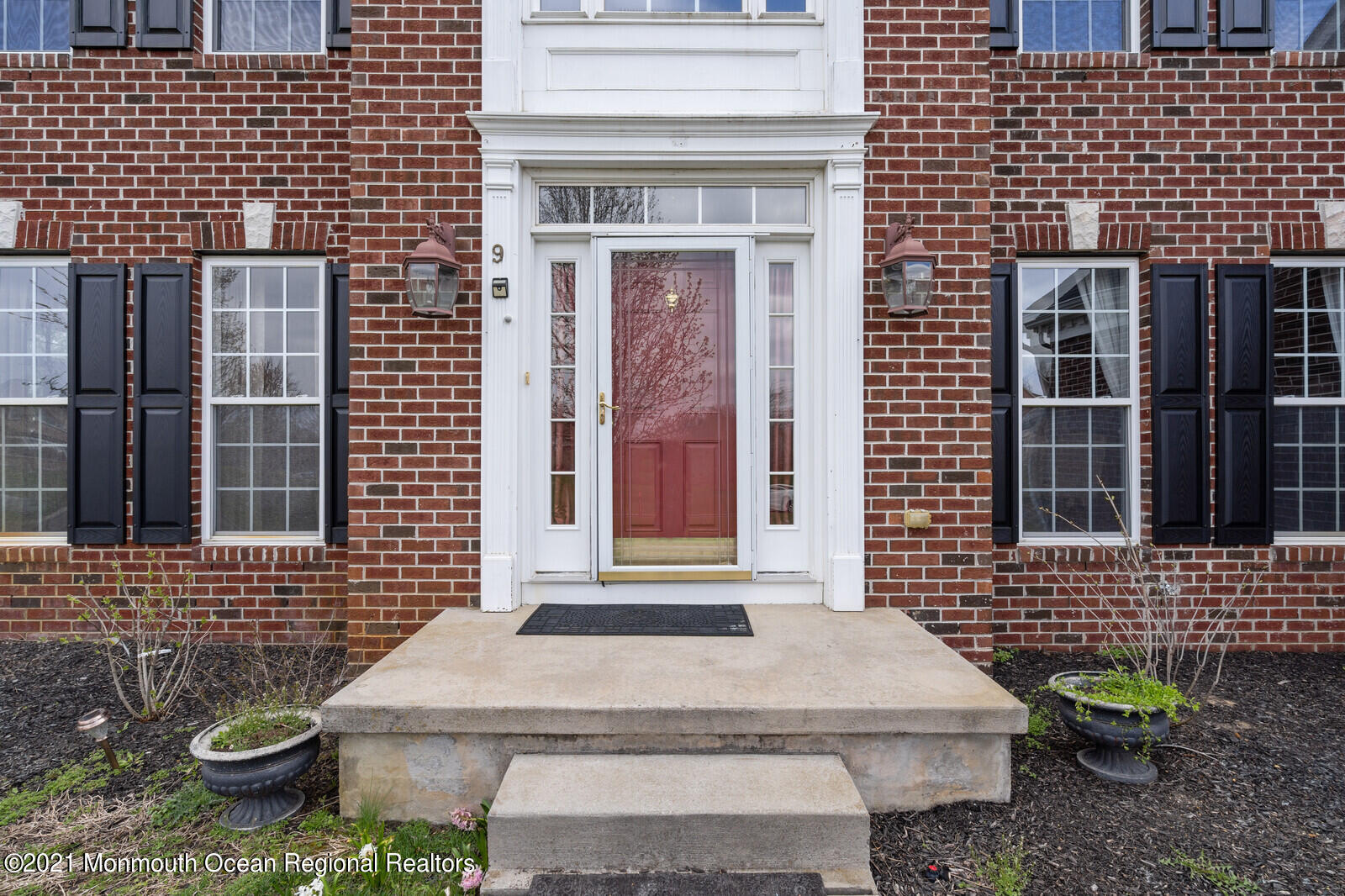 9 Nicholas Court Cream Ridge, NJ 08514 - Photo 4 of 53 a brick house with a outdoor space