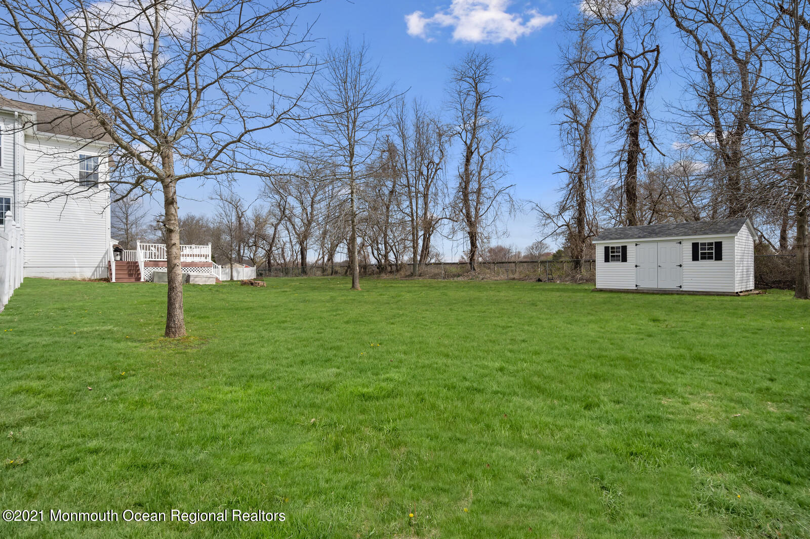 9 Nicholas Court Cream Ridge, NJ 08514 - Photo 50 of 53 a backyard of a house with lots of green space