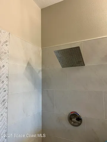 a view of a livingroom with furniture and wooden floor