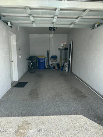 a bathroom with double vanity and a shower
