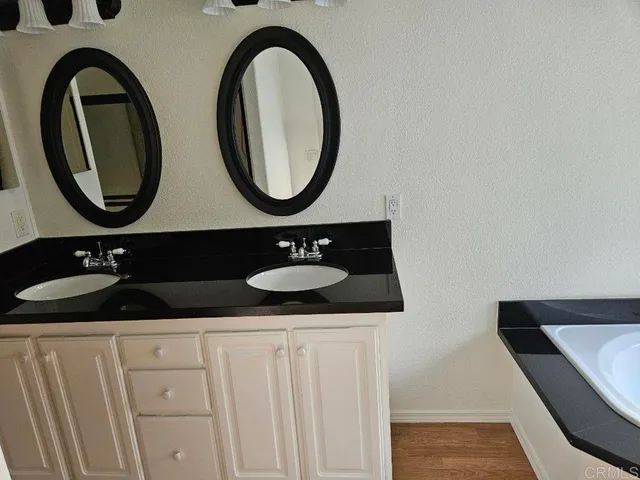 a bathroom with a toilet and a sink