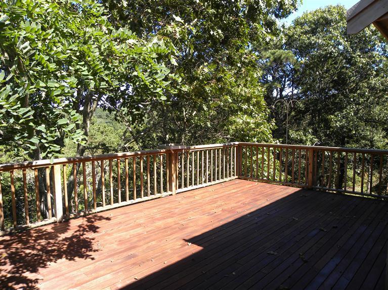 9 Josephs Road Truro, MA 02666 - Photo 7 of 14 a balcony with wooden floor