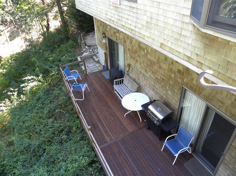 9 Josephs Road Truro, MA 02666 - Photo 8 of 14 a view of balcony with wooden floor and outdoor seating