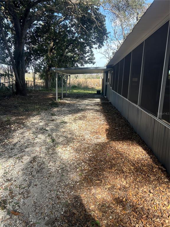 10895 Southeast Timucuan Road Summerfield, FL 34491 - Photo 5 of 23 a view of backyard with green space
