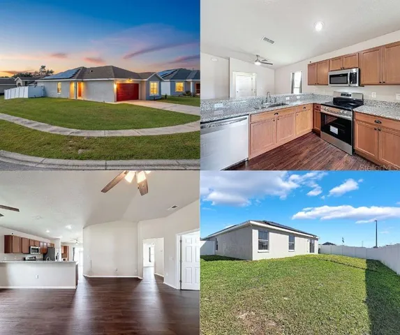 a kitchen with stainless steel appliances granite countertop a sink and a stove top oven
