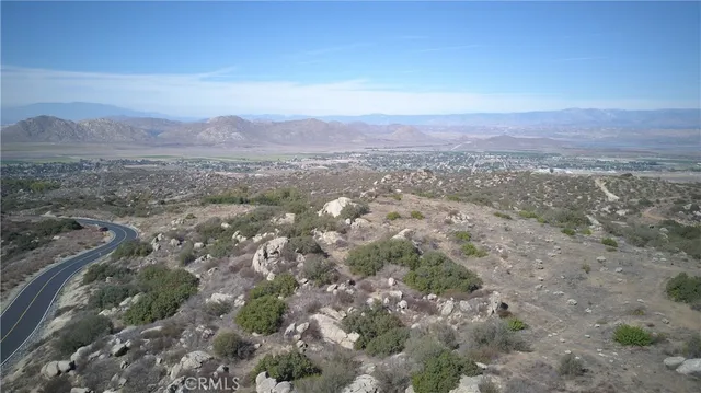 a view of a city with mountains in the background