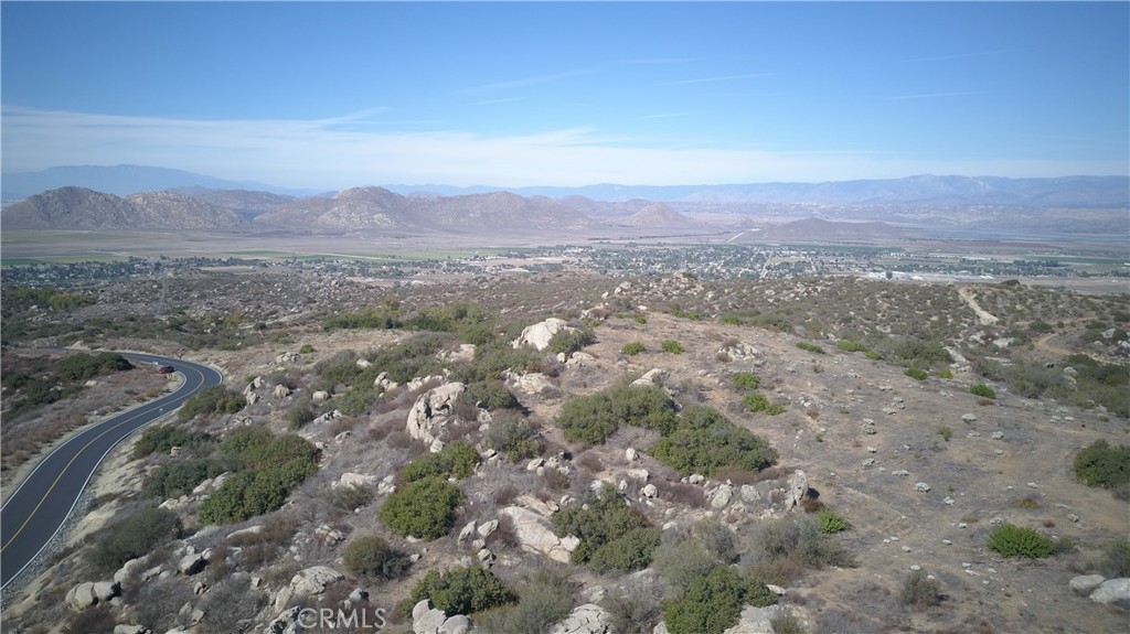 22990 Maclean Ranch Homeland, CA 92548 - Photo 12 of 26 a view of a city with lush green forest
