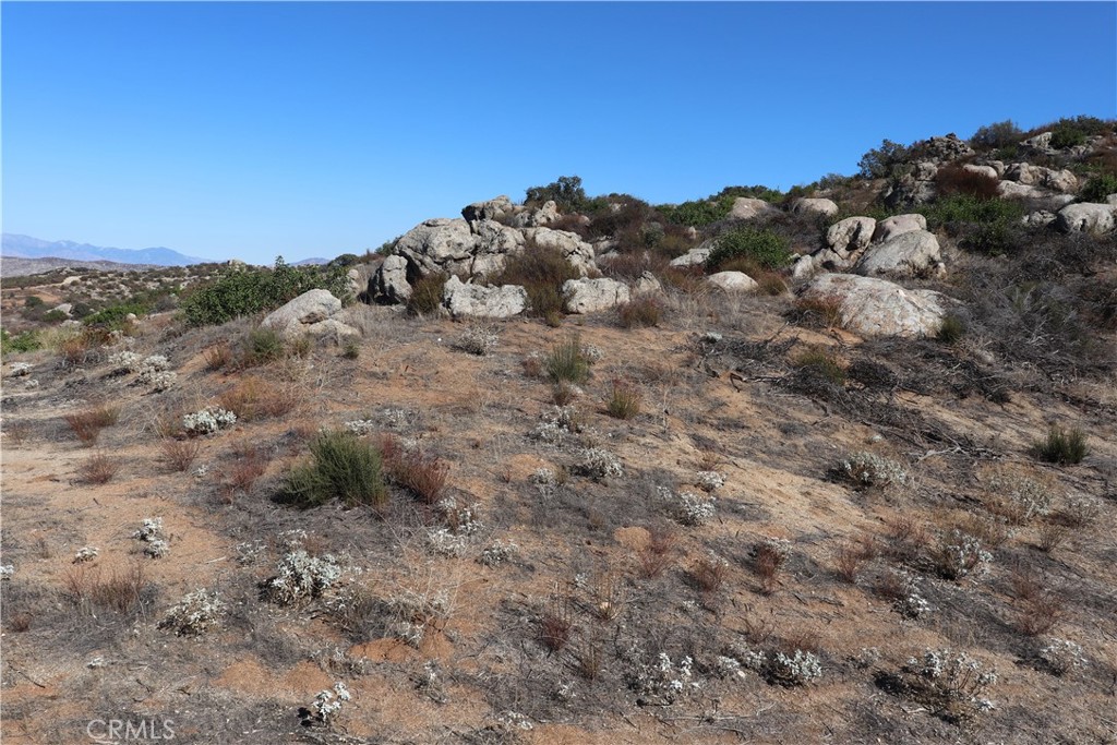 22990 Maclean Ranch Homeland, CA 92548 - Photo 17 of 26 a view of a dry top of a mountain
