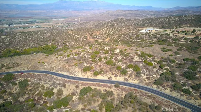 a view of a yard from a balcony