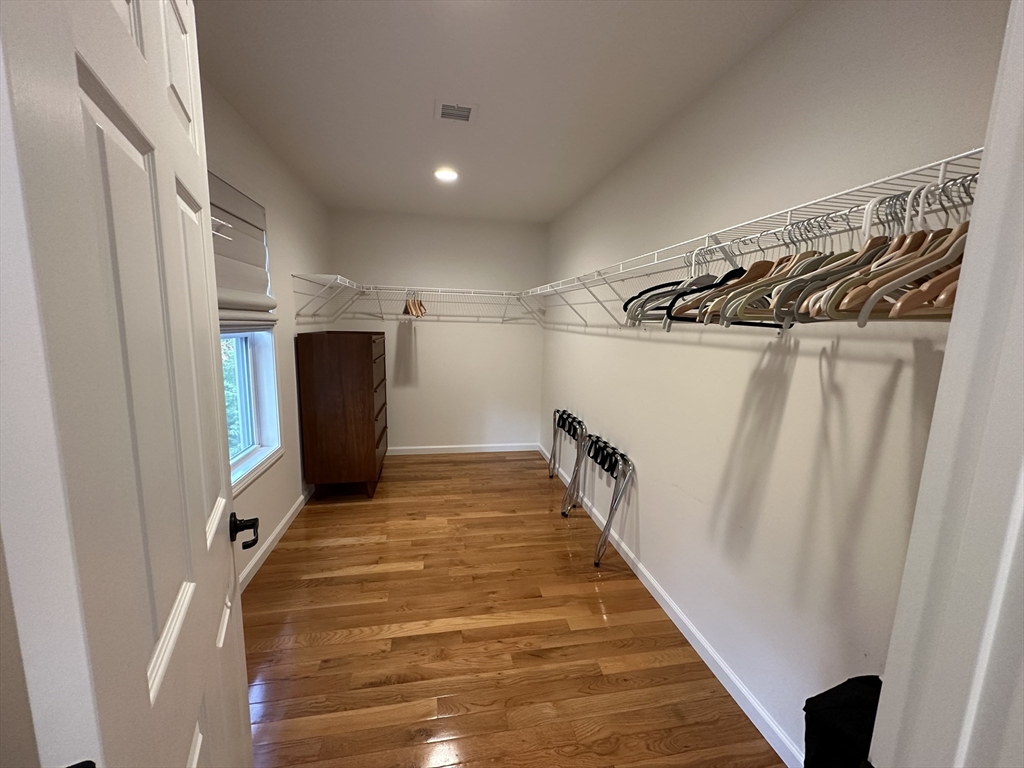 151 Tashmoo Avenue Tisbury, MA 02568 - Photo 21 of 28 a view of a hallway with wooden floor and staircase
