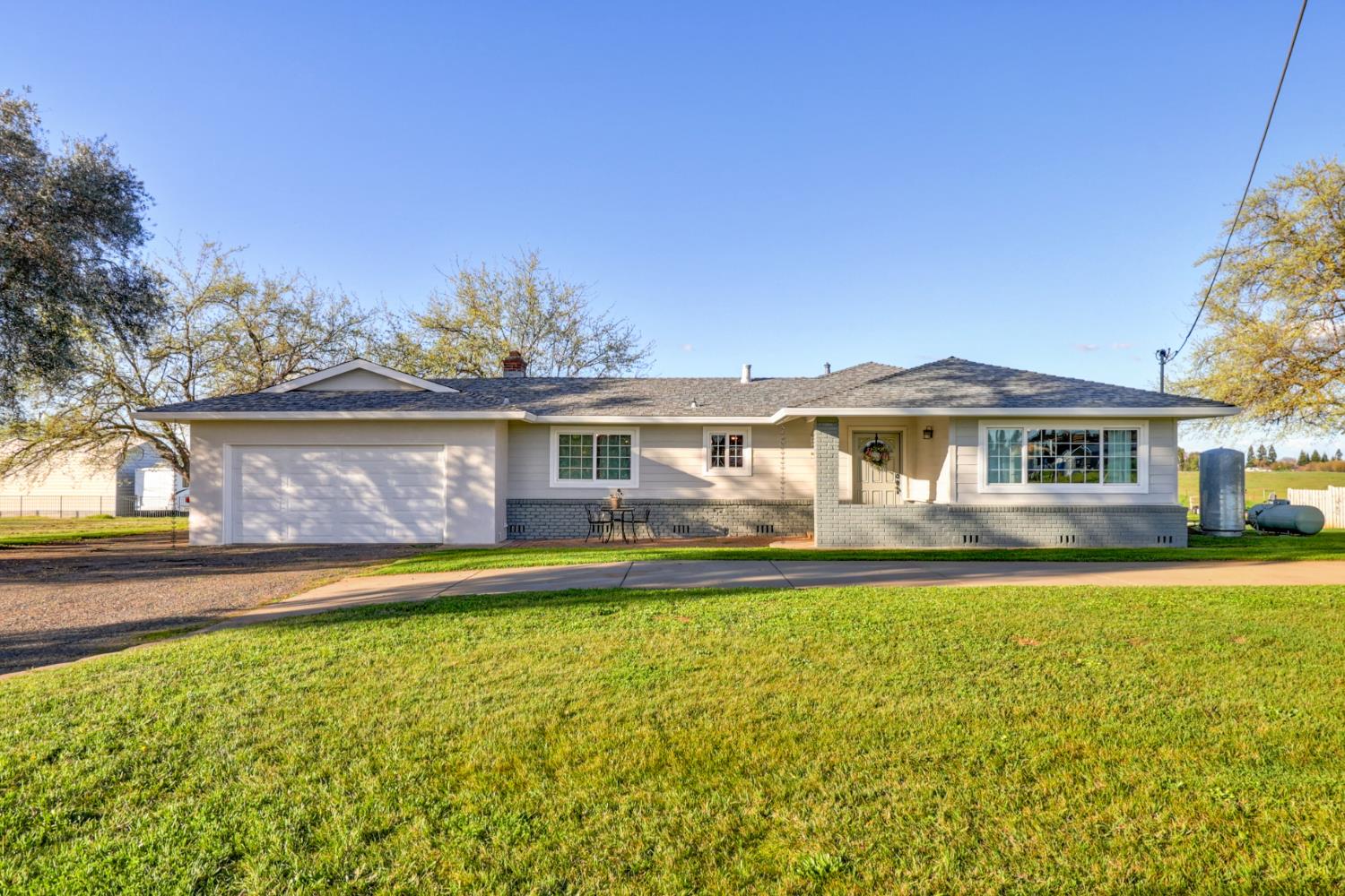 10691 Calvine Road Sacramento, CA 95830 - Photo 3 of 47 a front view of a house with swimming pool having outdoor seating