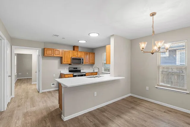 a view of kitchen and sink