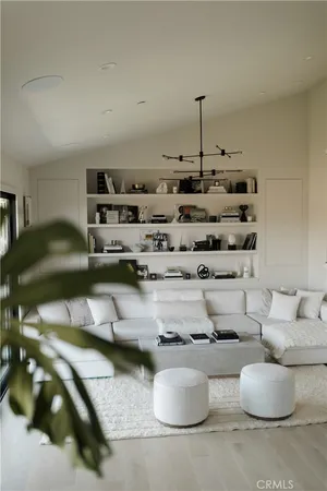 a kitchen with a table and chairs