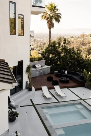 a view of a pool from a balcony