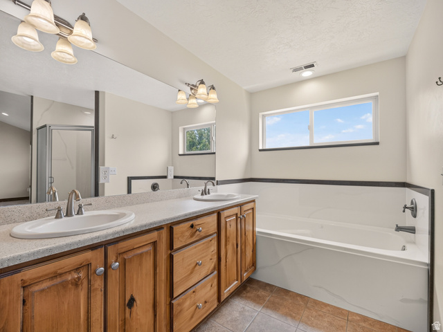 1279 West 1500th Street North Mapleton, UT 84664 - Photo 43 of 83 Double vanity with integrated sinks and wood-finish cabinetry