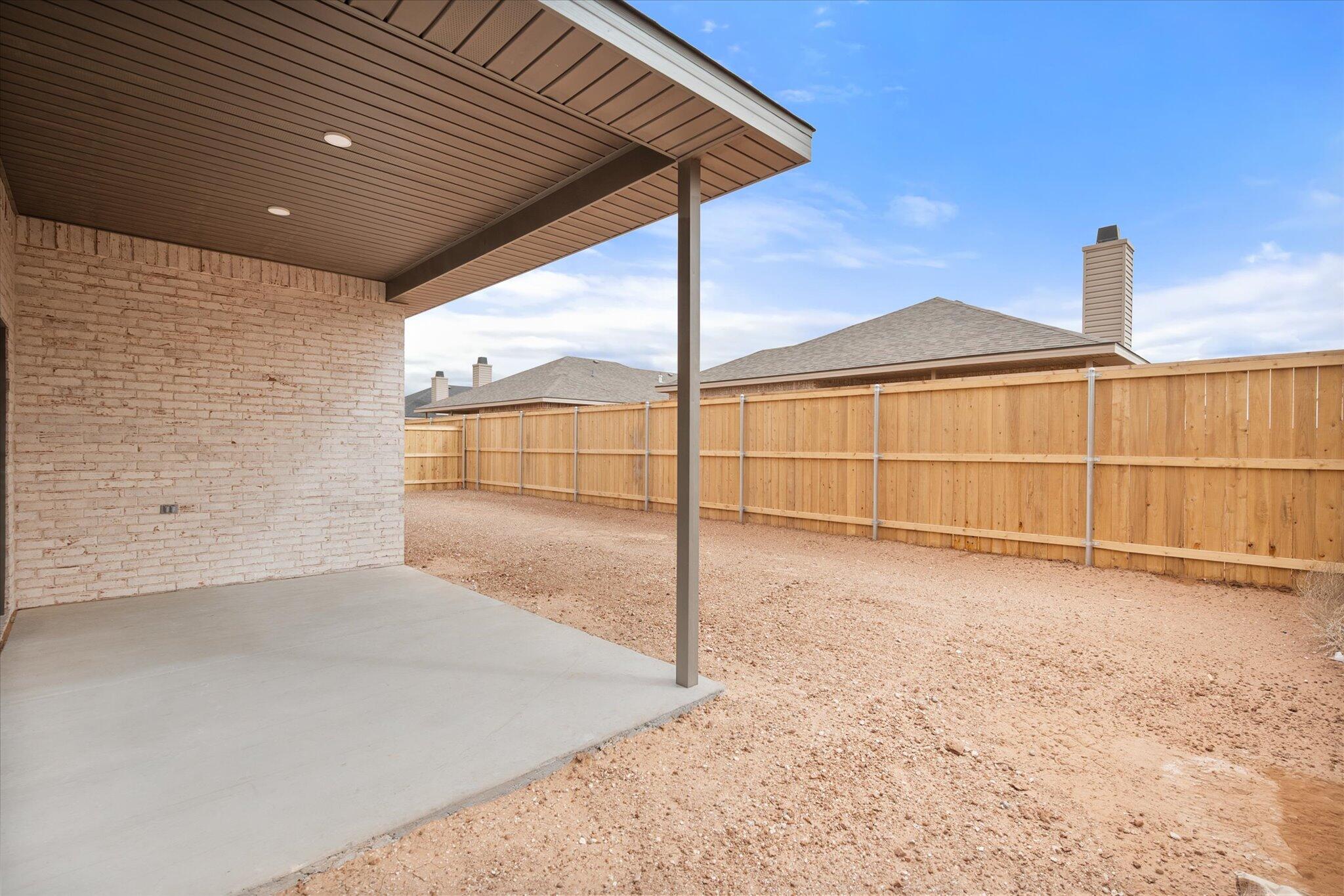 6827 54th Street Lubbock, TX 79407 - Photo 23 of 23 a view of a backyard