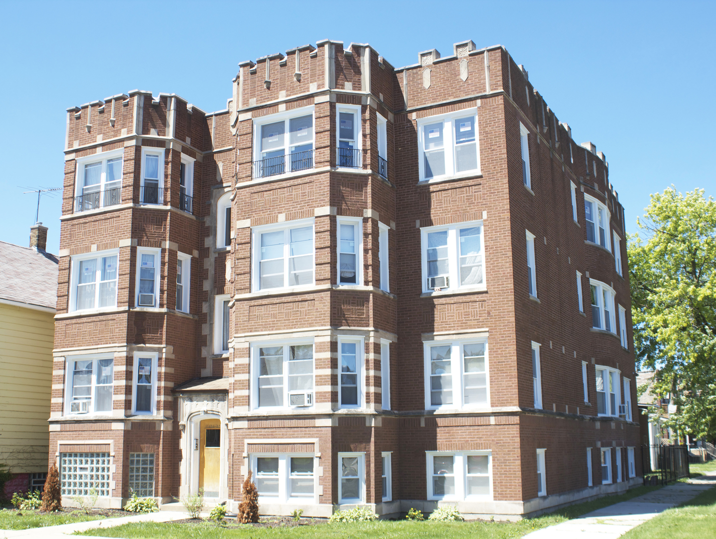 11432 South Indiana Avenue Chicago, IL 60628 - Photo 1 of 21 a front view of a multi story building