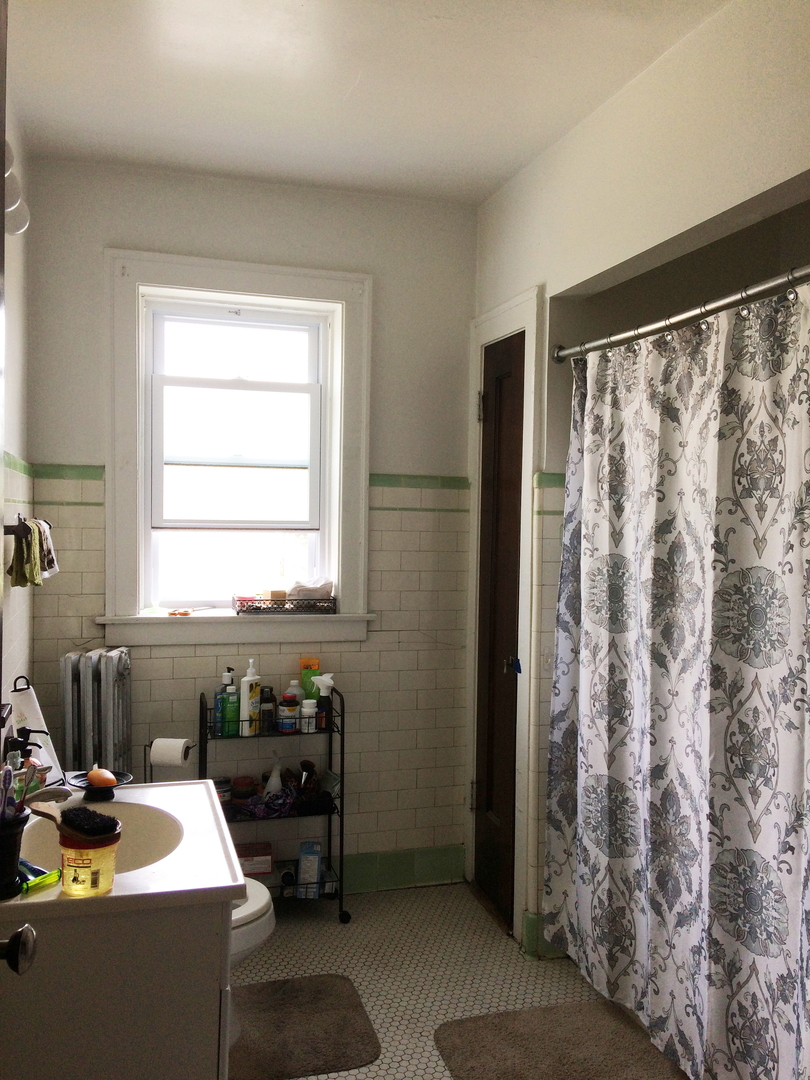 11432 South Indiana Avenue Chicago, IL 60628 - Photo 15 of 21 a room with curtain wooden floor and a window