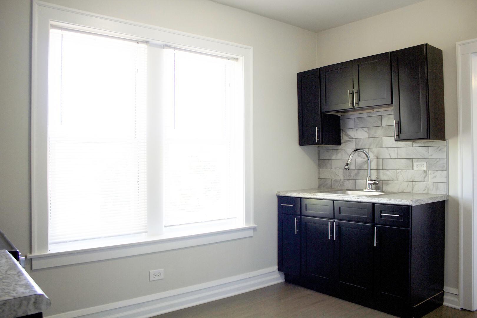 11432 South Indiana Avenue Chicago, IL 60628 - Photo 7 of 21 a kitchen with stainless steel appliances a sink stove and microwave