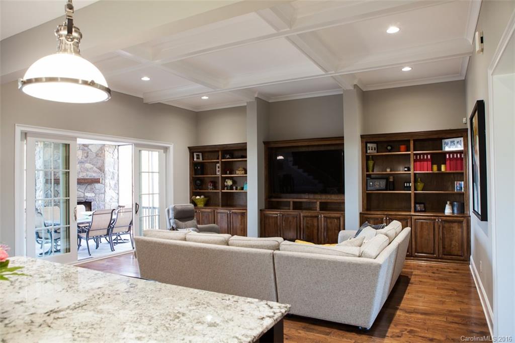 792 Harvest Pointe Drive Fort Mill, SC 29708 - Photo 12 of 24 a living room with furniture a rug and a large window