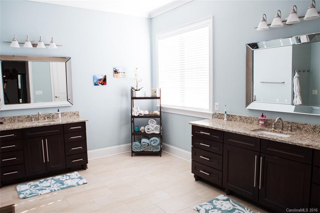 792 Harvest Pointe Drive Fort Mill, SC 29708 - Photo 17 of 24 a bathroom with a sink vanity and mirror