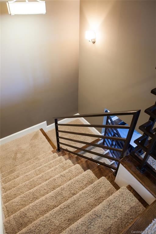792 Harvest Pointe Drive Fort Mill, SC 29708 - Photo 20 of 24 a bedroom with a bed and chair