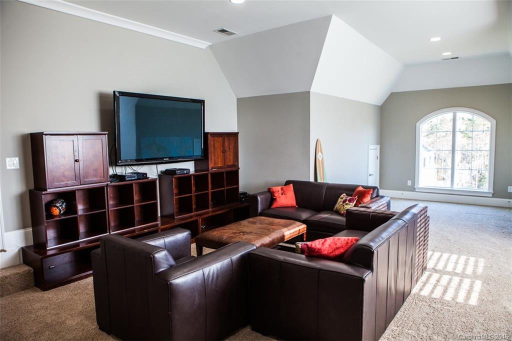 792 Harvest Pointe Drive Fort Mill, SC 29708 - Photo 22 of 24 a living room with furniture and a flat screen tv