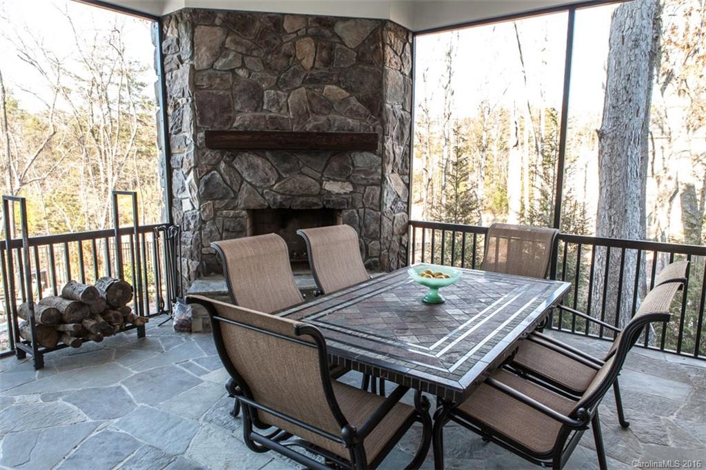 792 Harvest Pointe Drive Fort Mill, SC 29708 - Photo 5 of 24 a view of a patio with a table and chairs