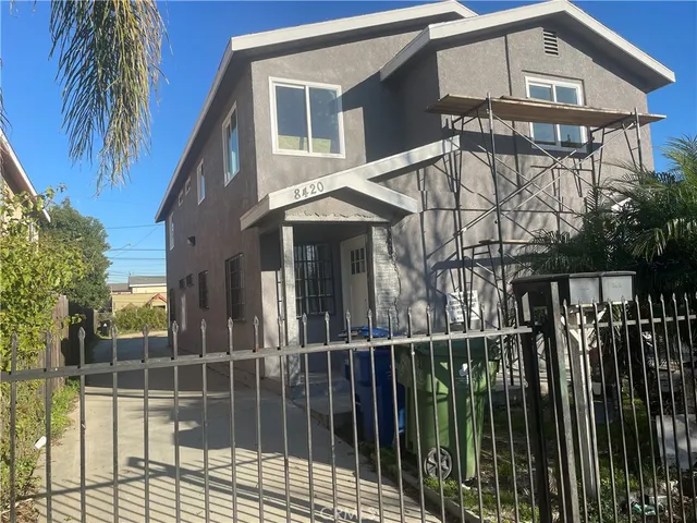 an aerial view of a house with outdoor space