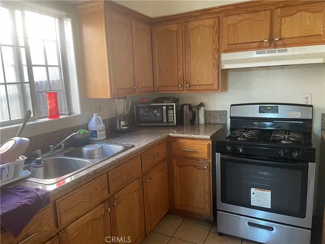 a bedroom with a bed and dresser