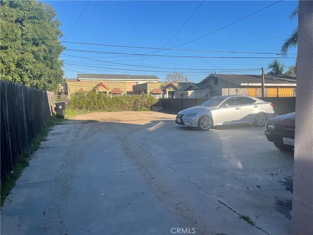 a kitchen with a refrigerator and a stove
