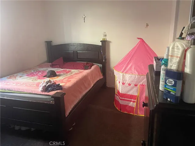 a bathroom with a toilet and a sink