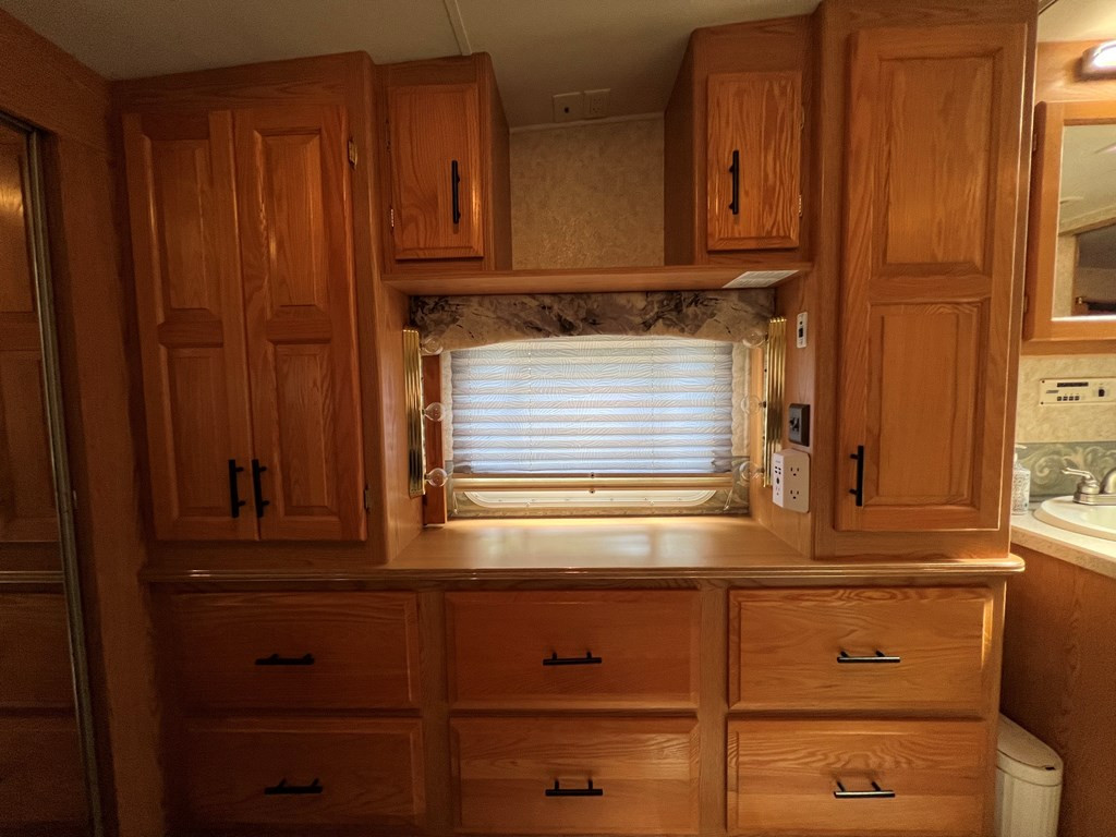 294 Pioneer Ests Road Murphy, NC 28906 - Photo 20 of 36 RV bedroom dresser/cabinets