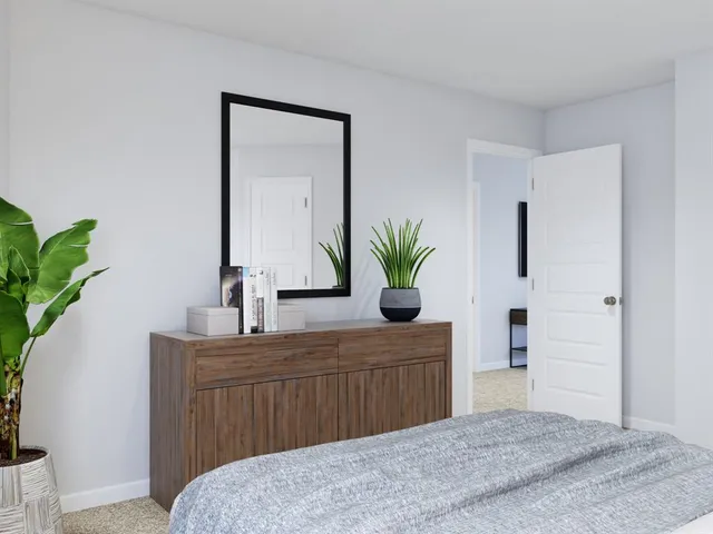 a close up of a bathtub with a white shower